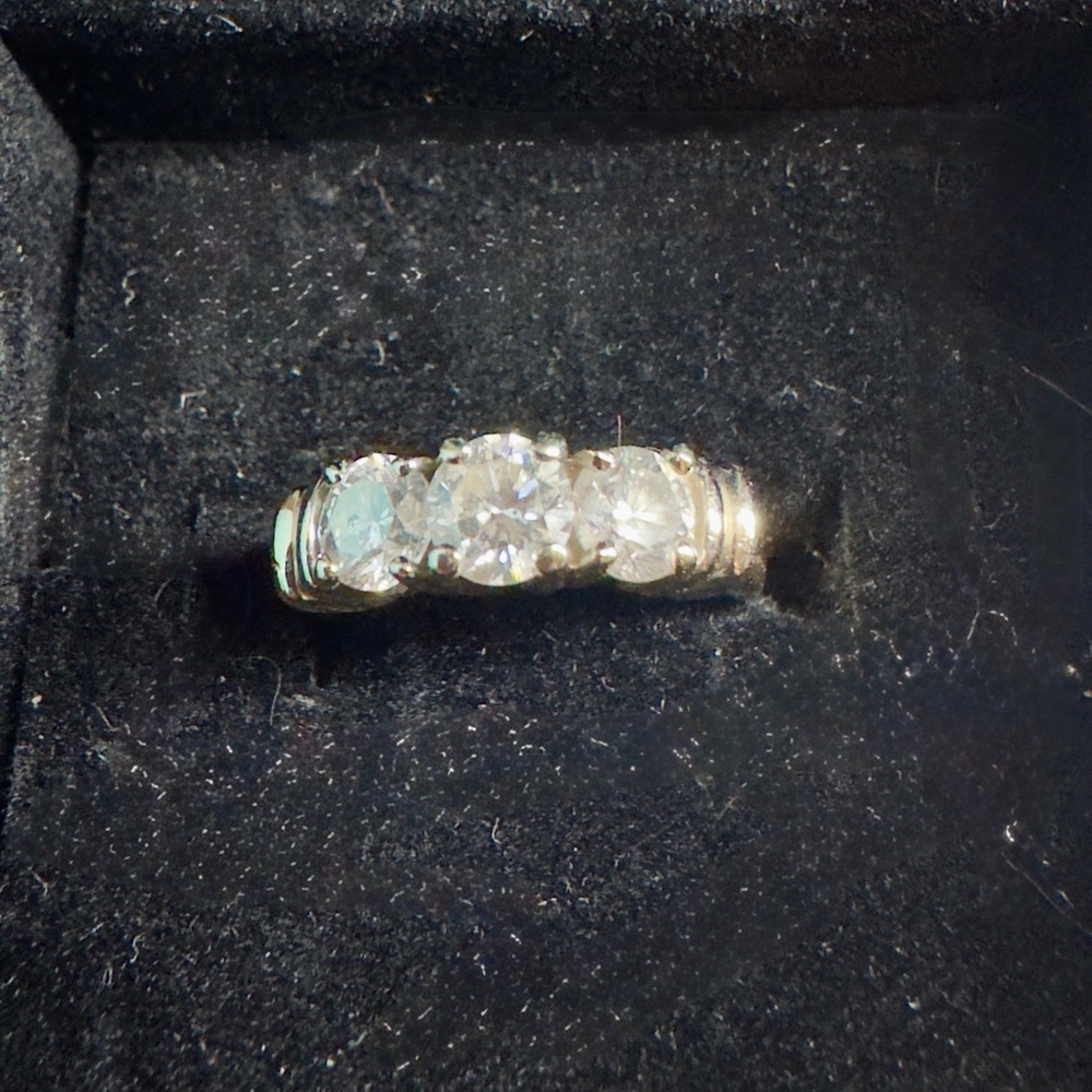 Elegant Ladies 14 karat two-tone past, present and future diamond ring.